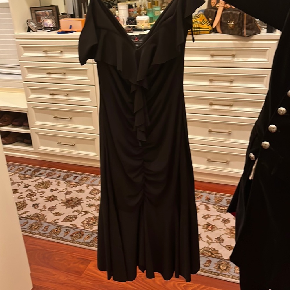 Never worn new with tags beautiful black evening/cocktail dress